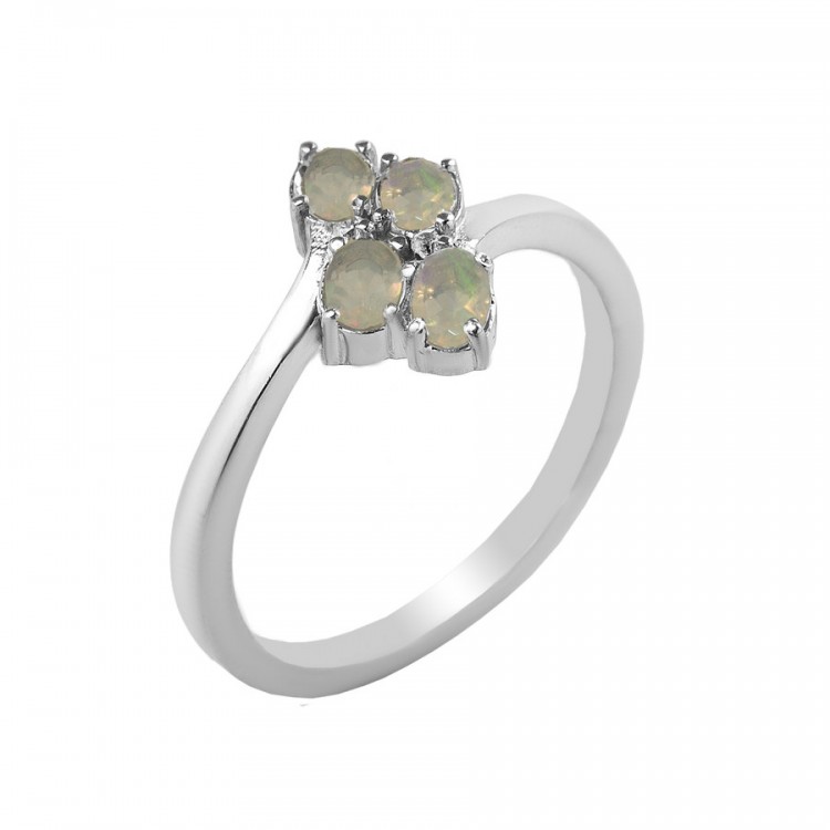 Silver ring with opals