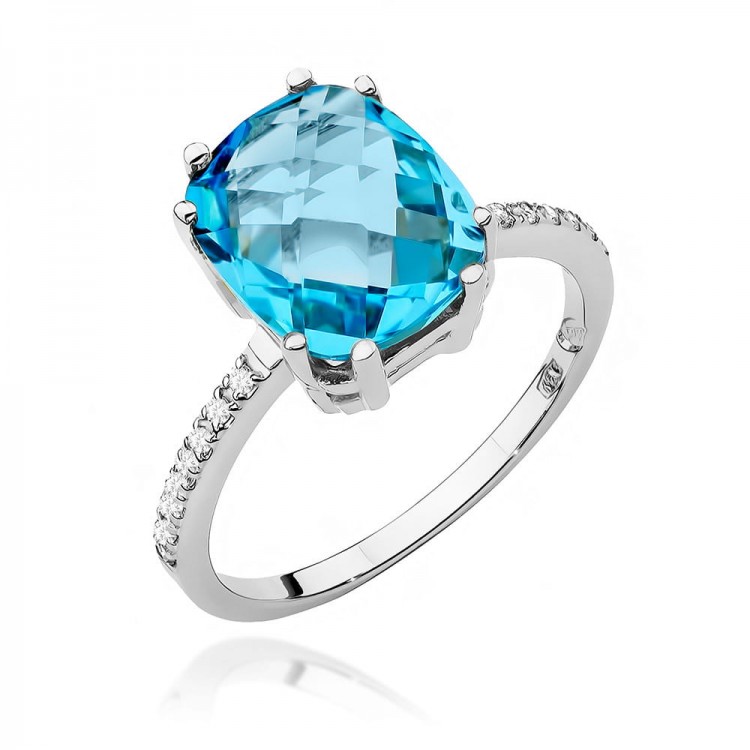White gold ring with topaz and diamonds