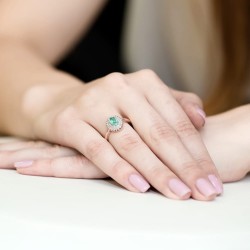 Gold ring with emerald and diamonds